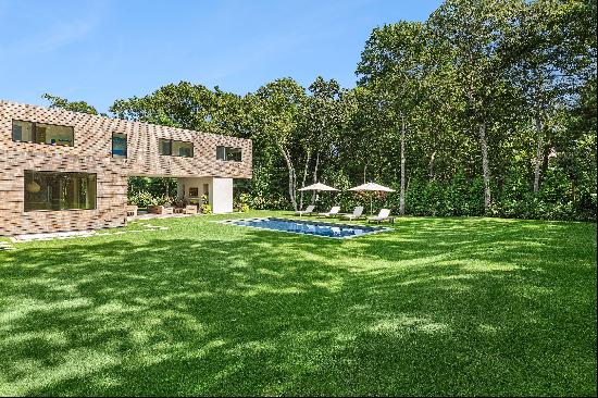 Welcome to 26 Alewive Brook Rd East Hampton, where modern luxury meets sustainable living.