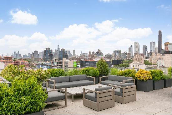 Experience luxurious living in the heart of Park Slope with this stunning, sun-drenched