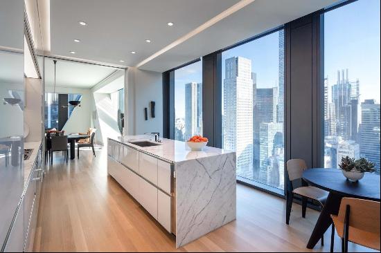 Discover unparalleled luxury at Residence 40A in the renowned 53 West 53rd Street, avai