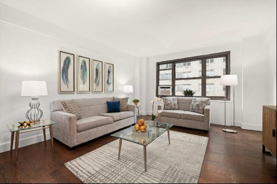 Say hello to Apartment 6E at Lex 54 - a 2-bed/2-bath floor-through condo with three exp