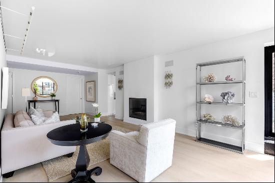 Experience luxurious living in this stunning two-bedroom, two-bath penthouse apartment 