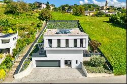 Lugano-Comano: modern villa with outdoor pool for sale