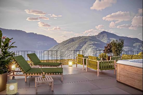 Modern penthouse apartment for sale in Lugano-Carona with breathtaking lake view & roof t