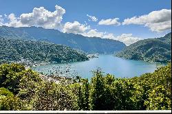 Modern penthouse apartment for sale in Lugano-Carona with breathtaking lake view & roof t