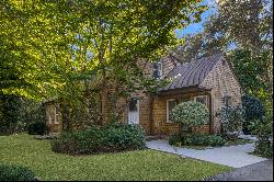 Comfort, Privacy, and Timeless Charm on an Acre of Lush Grounds