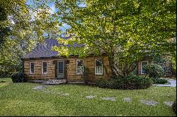 Comfort, Privacy, and Timeless Charm on an Acre of Lush Grounds