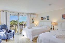 Impeccably Renovated Top-Floor Corner Unit with Stunning Bay Views