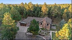 Expansive Black Forest custom rancher on gorgeous wooded 5 acres