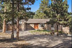 Expansive Black Forest custom rancher on gorgeous wooded 5 acres