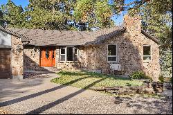 Expansive Black Forest custom rancher on gorgeous wooded 5 acres