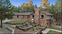 Expansive Black Forest custom rancher on gorgeous wooded 5 acres