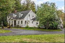 Cape-Style Charm with a High-End Kitchen and First Floor Suite