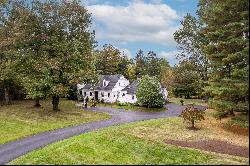 Cape-Style Charm with a High-End Kitchen and First Floor Suite