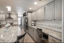 Stunning Southmoor Ranch with Renovated Kitchen and Private, Lush Backyard