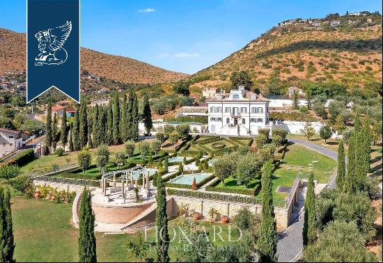 Elegant 19th-century estate with a park and olive grove for sale in the countryside north 