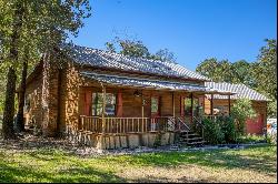 STUNNING LOG CABIN NESTLED ON 3 ACRES