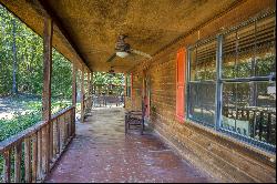 STUNNING LOG CABIN NESTLED ON 3 ACRES