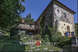 RESTORED FARMHOUSE WITH MEDIEVAL TOWER FOR SALE IN TUSCANY