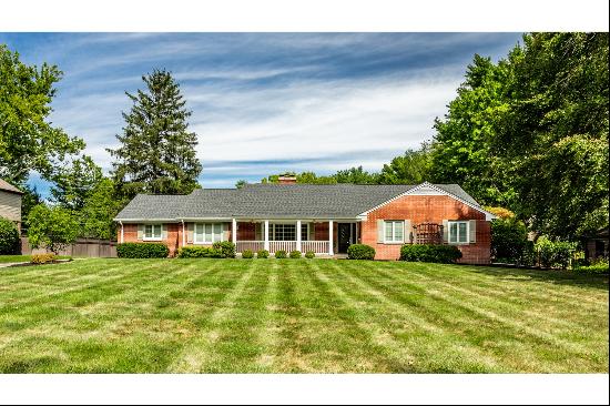 Brick Ranch Nestled Among Mature Trees In A Tranquil Setting