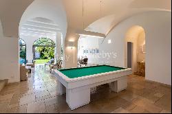 Elegant seafront villa with swimming pool and private garden