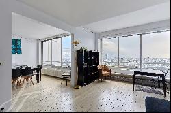 Duplex on the top floors with exceptional views of Paris and no overlooked neighbors