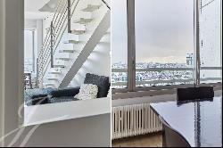 Duplex on the top floors with exceptional views of Paris and no overlooked neighbors