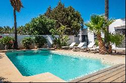 Charming 4-Bedroom Villa in Cala Tarida For Sale