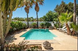 Charming 4-Bedroom Villa in Cala Tarida For Sale