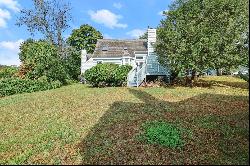 Tranquil End Unit Ranch with Pond Views