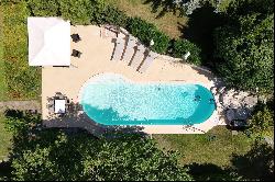 Villa with pool surrounded by greenery near Fano