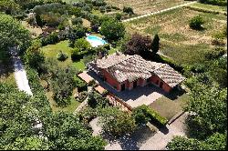 Villa with pool surrounded by greenery near Fano