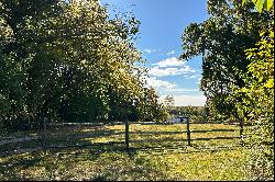 Hilltop Home with Farm Views and Vast Potential