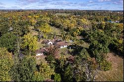 Hilltop Home with Farm Views and Vast Potential