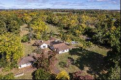 Hilltop Home with Farm Views and Vast Potential