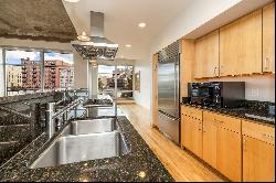 Exceptional Riverwalk Condo with Unparalleled River and City Views