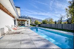 A contemporary house with a swimming pool