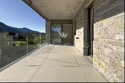 Lugano-Magliaso: Modern penthouse apartment for sale with lake view, available as a secon