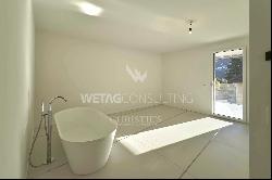 Lugano-Magliaso: Modern penthouse apartment for sale with lake view, available as a secon