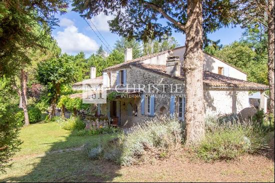 Stunning country estate featuring a charming guardian cottage and a refreshing pool, set 