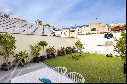 Fantastic townhouse with large private terrace and parking for two cars.