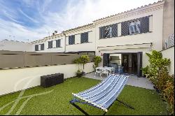 Fantastic townhouse with large private terrace and parking for two cars.