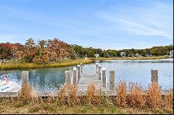 Waterfront: Beach on One Side, Cove with Dock on the Other