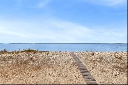 Waterfront: Beach on One Side, Cove with Dock on the Other