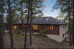 Remarkable custom rancher on 5 acres with views of Pikes Peak