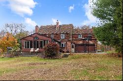 This stunning 1938 Tudor home perfectly balances elegance and comfort