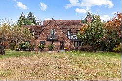 This stunning 1938 Tudor home perfectly balances elegance and comfort