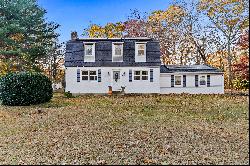 Charming 2,278 sq ft, 4-bedroom, 2.5-bath colonial resting on a picturesque 2-ac