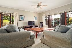 Immaculate home in a tree-lined street.