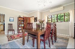 Immaculate home in a tree-lined street.