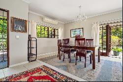 Immaculate home in a tree-lined street.